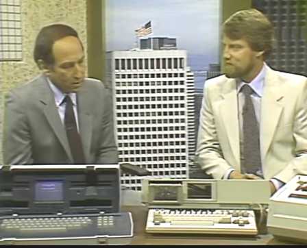 Stewart Cheifet and Gary Kildall on the set of &ldquo;Computer Chronicles.&rdquo; On the desk in front of them are an Osborne-1 computer and a Coleco ADAM computer.