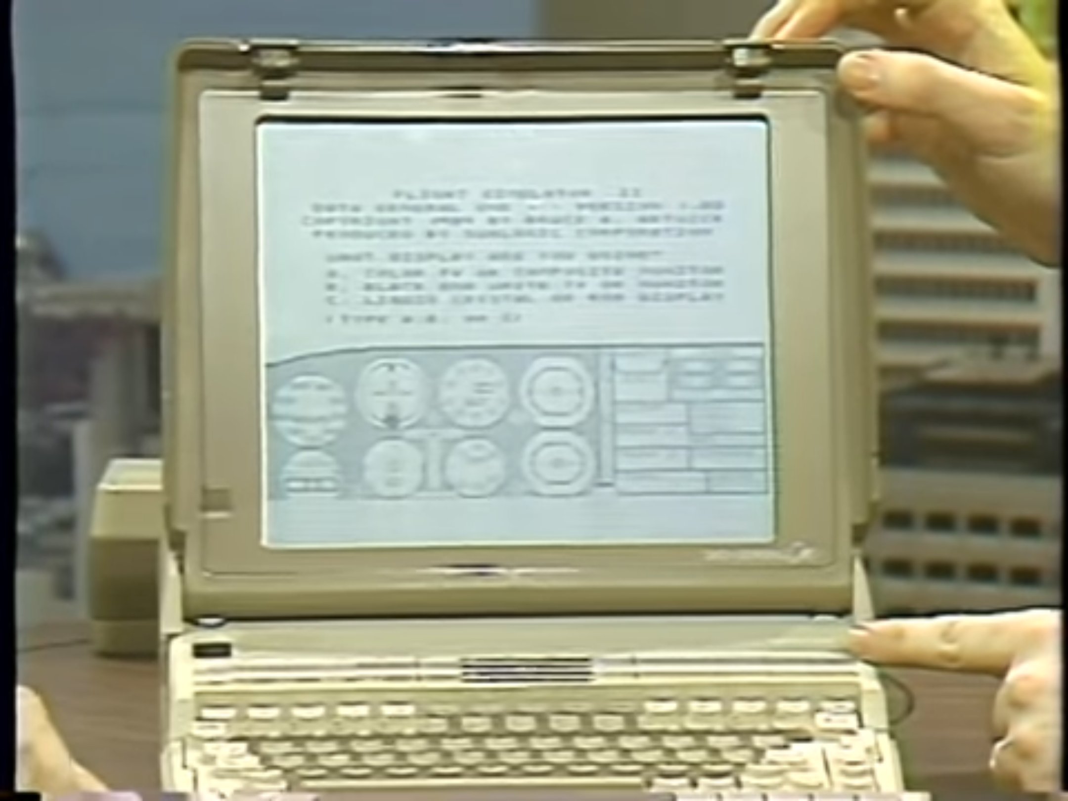 Microsoft Flight Simulator running on a black-and-white display of a Data General-One portable computer during an episode of “Computer Chronicles” from January 1985.