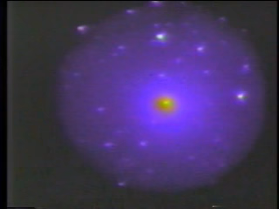 A Doppler image of Halley&rsquo;s Comet. The image is of a large blue-colored sphere with a smaller sphere, reddish-orange in color, at the center.